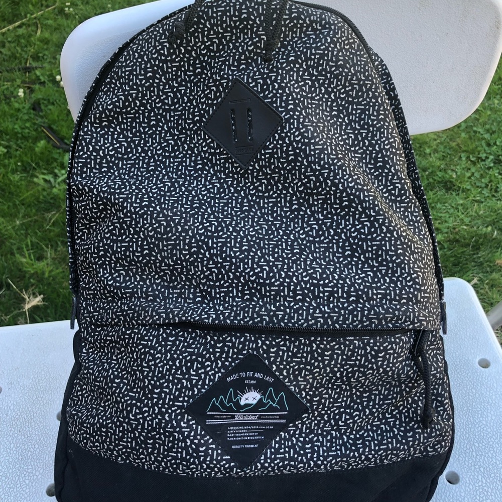 Divided Black/White Dots Light Backpack